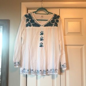 White tunic top with blue embroidery